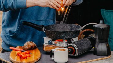 Camping stove and pan for outdoor cooking adventure.