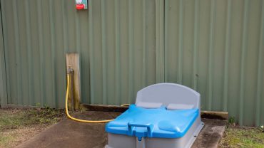 Portable toilet for RV and camping use.