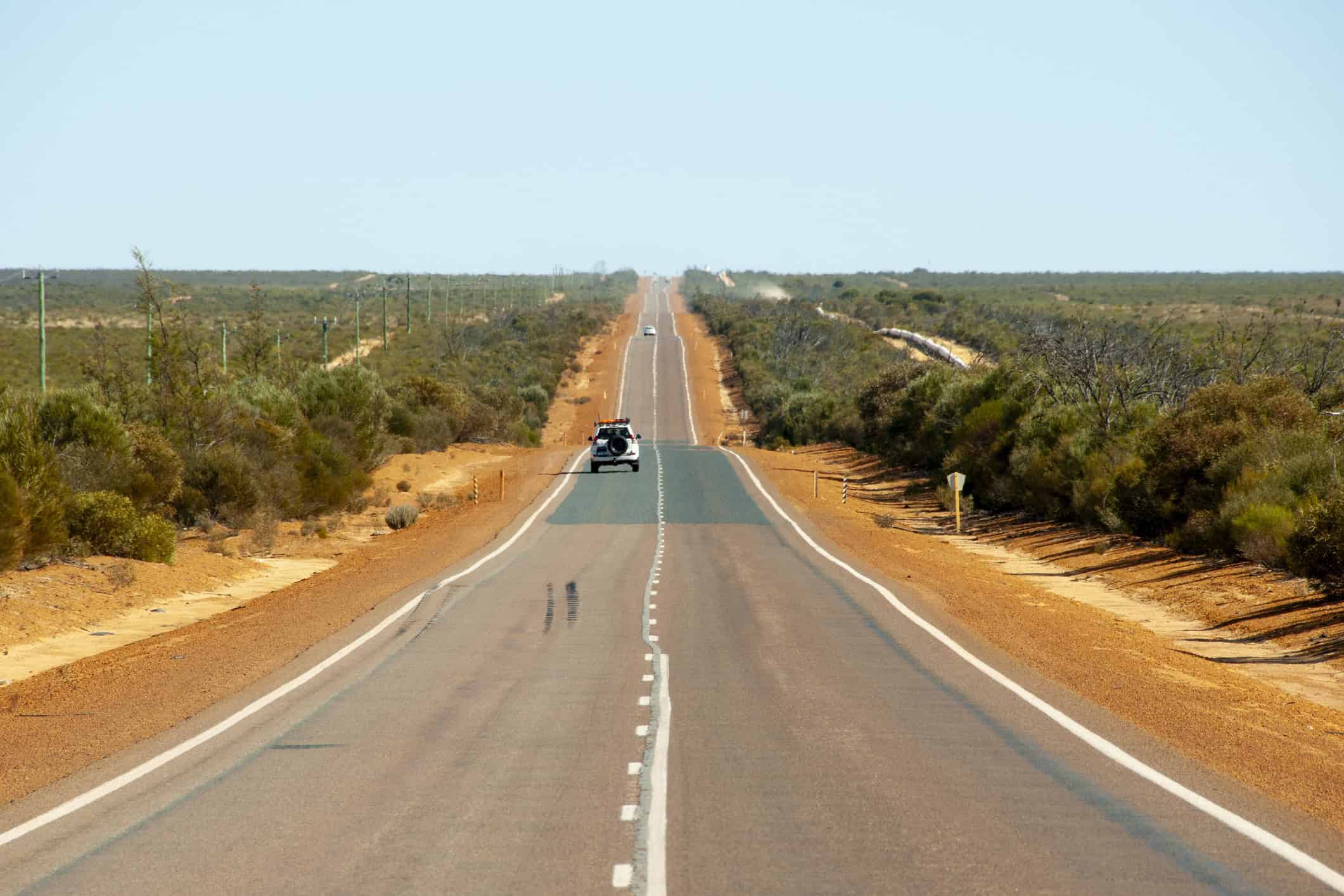 Split image showing wet season flooding in northern Australia versus winter camping in Tasmania